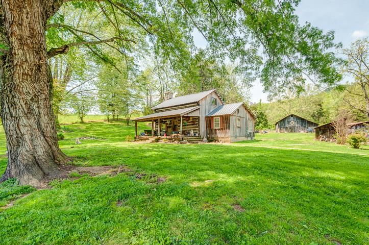 3534 Lizzie Sharp Pall Mall, TN 38577 - Photo 25 of 27 a front view of a house with a garden