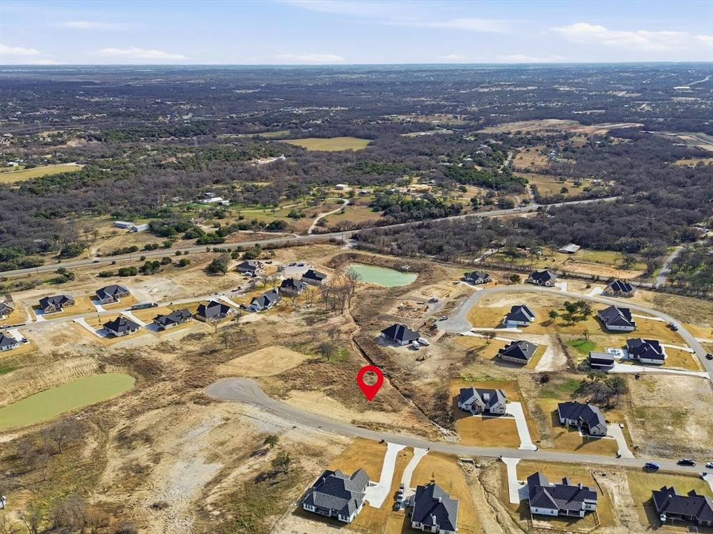 826 Wind River Pass Azle, TX 76020 - Photo 10 of 12 an aerial view of residential houses with outdoor space