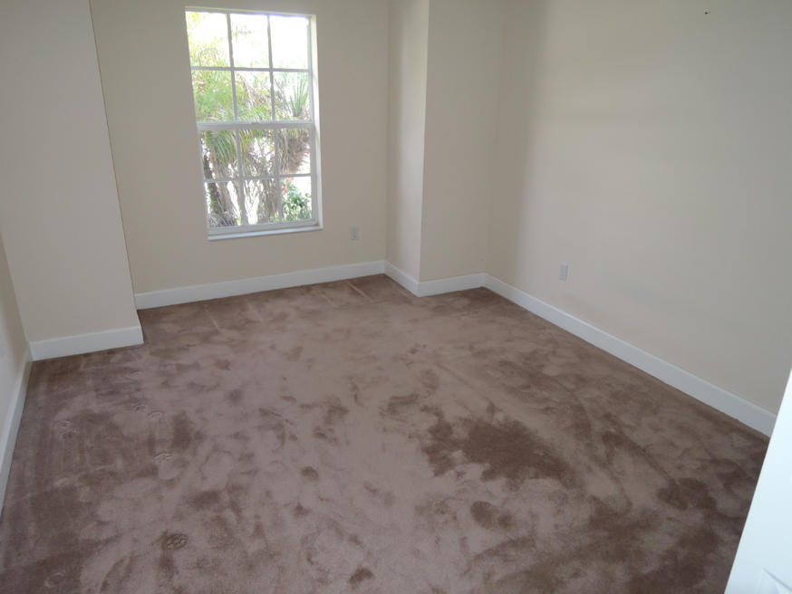 569 Southwest Undallo Road Port St. Lucie, FL 34953 - Photo 15 of 21 Second Bedroom