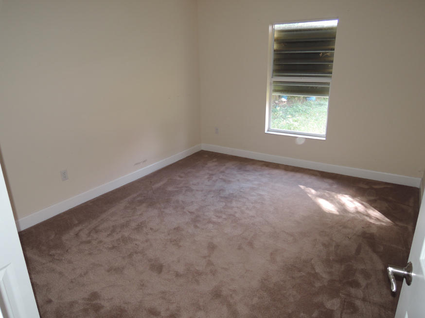 569 Southwest Undallo Road Port St. Lucie, FL 34953 - Photo 16 of 21 Third Bedroom