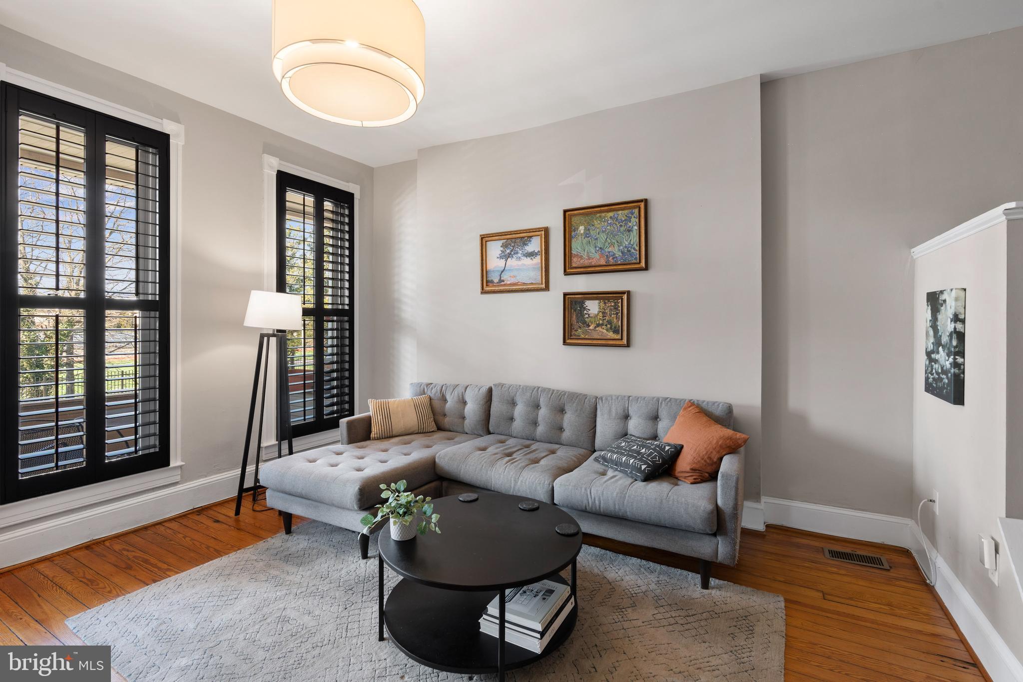 347 Yale Avenue Baltimore, MD 21229 - Photo 13 of 59 a living room with furniture and a window