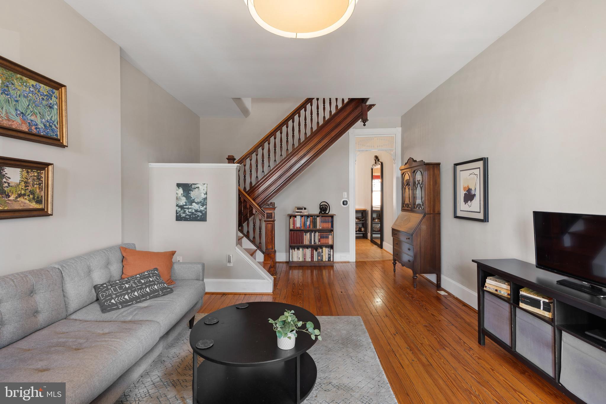 347 Yale Avenue Baltimore, MD 21229 - Photo 14 of 59 a living room with furniture and a flat screen tv