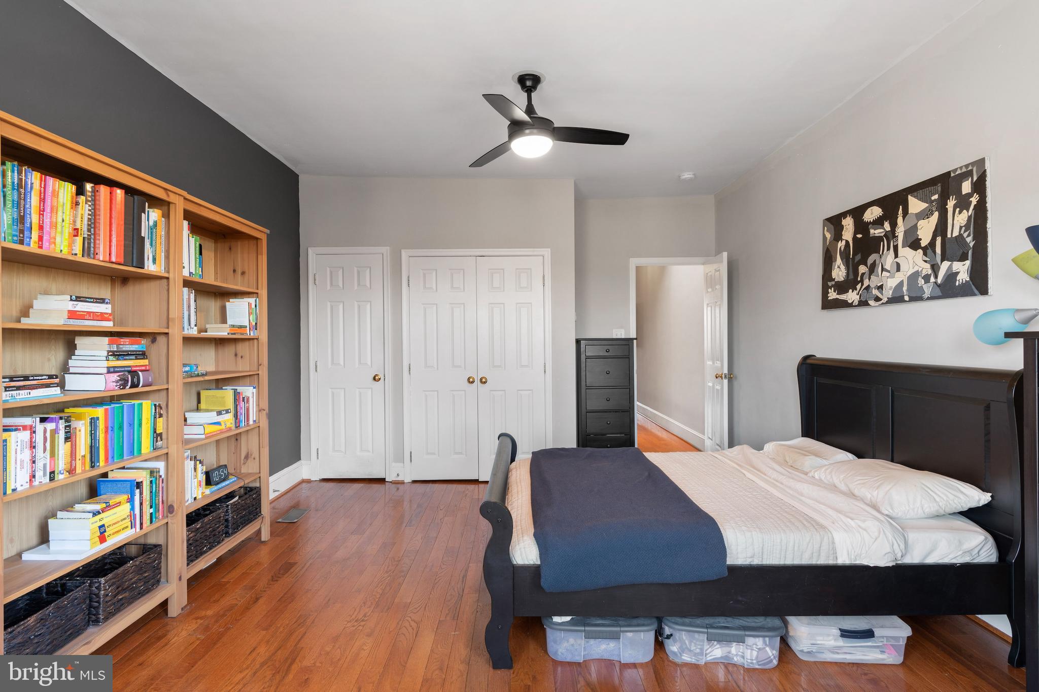 347 Yale Avenue Baltimore, MD 21229 - Photo 20 of 59 a bed room with a bed and a book shelf