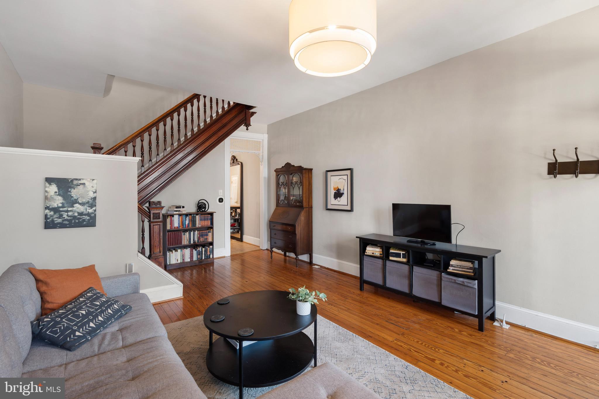 347 Yale Avenue Baltimore, MD 21229 - Photo 34 of 59 a living room with furniture and a flat screen tv