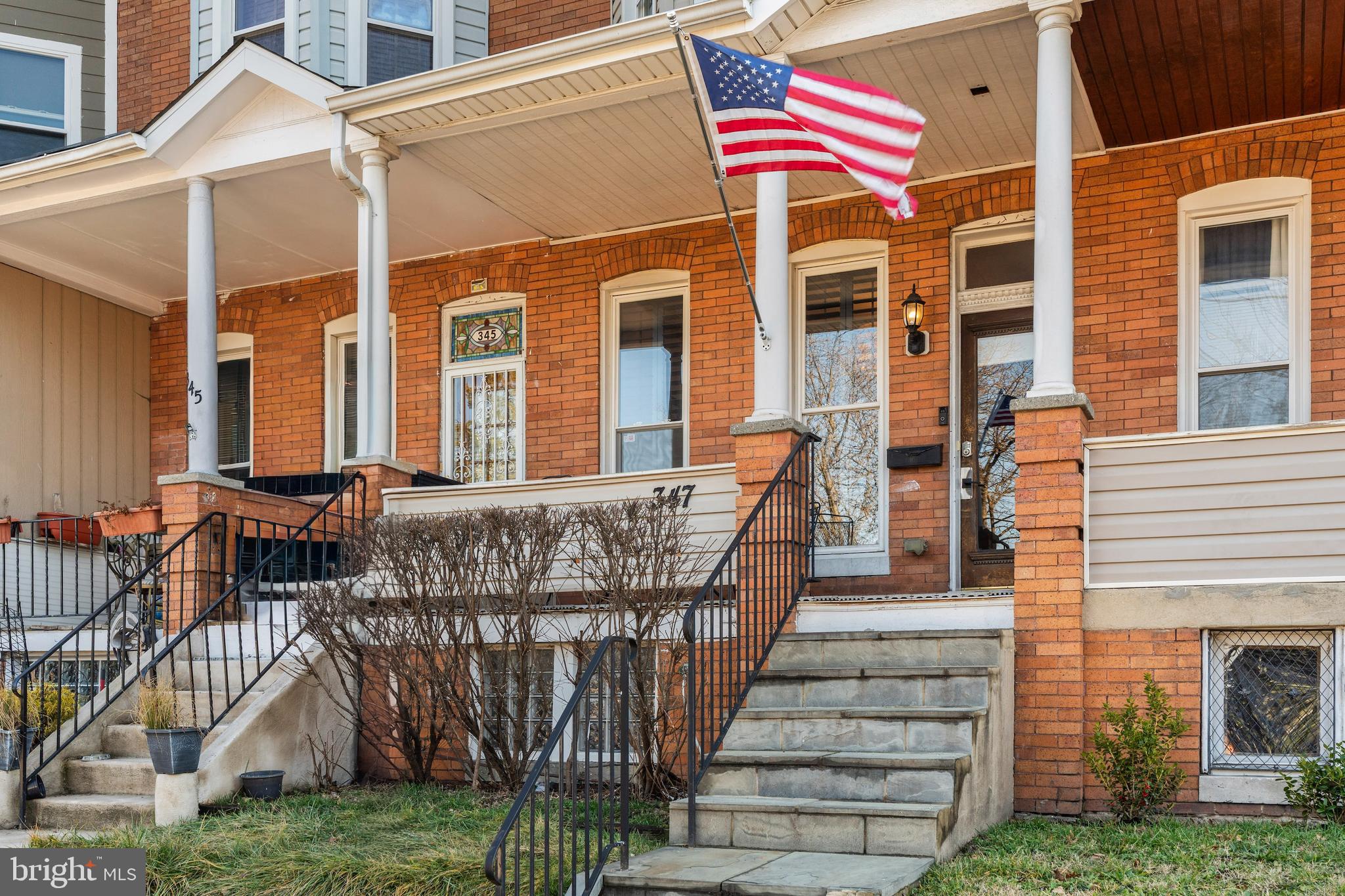 347 Yale Avenue Baltimore, MD 21229 - Photo 39 of 59 a front view of a house with a yard