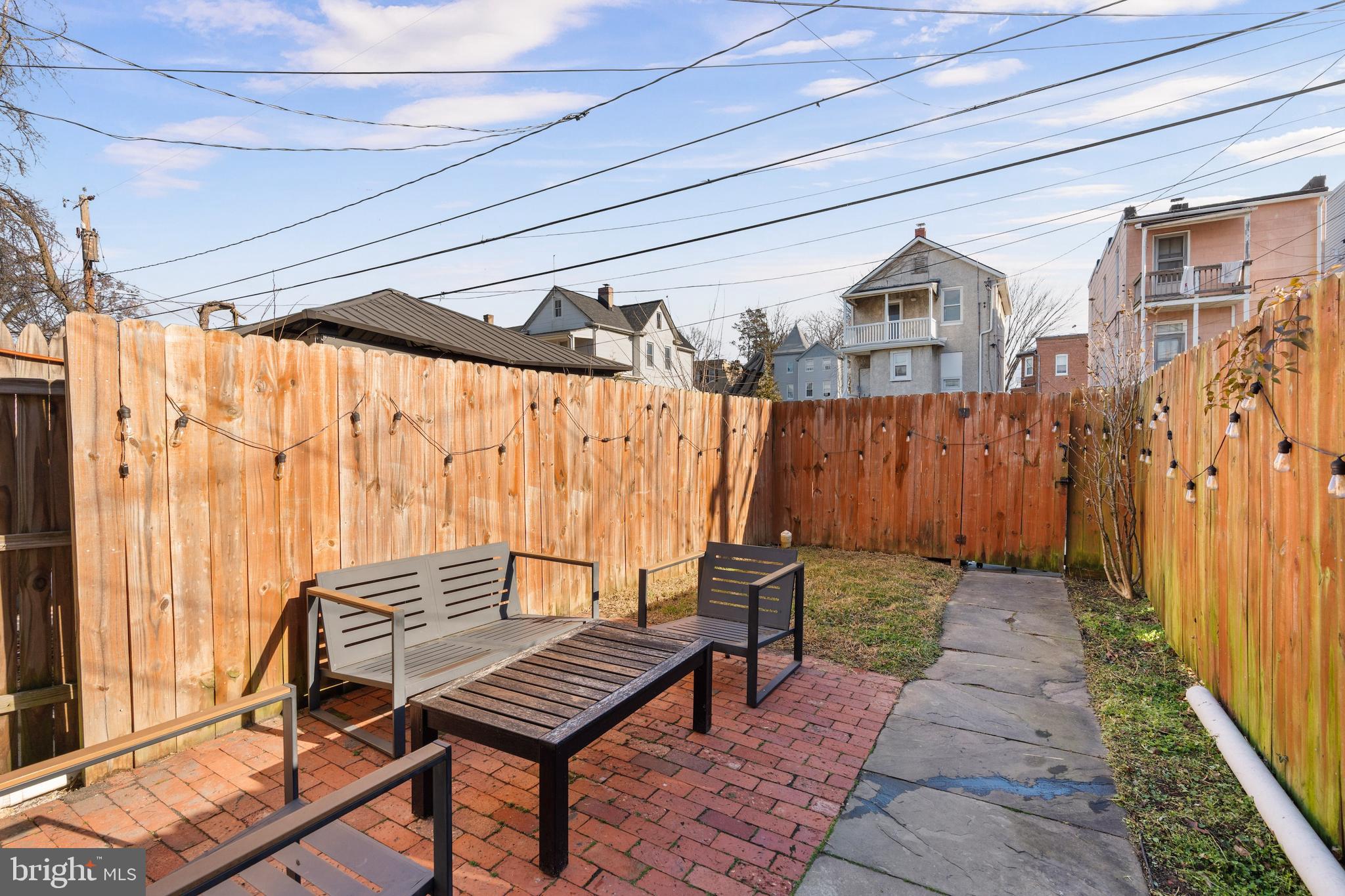 347 Yale Avenue Baltimore, MD 21229 - Photo 40 of 59 a view of outdoor space with wooden floor and outdoor seating