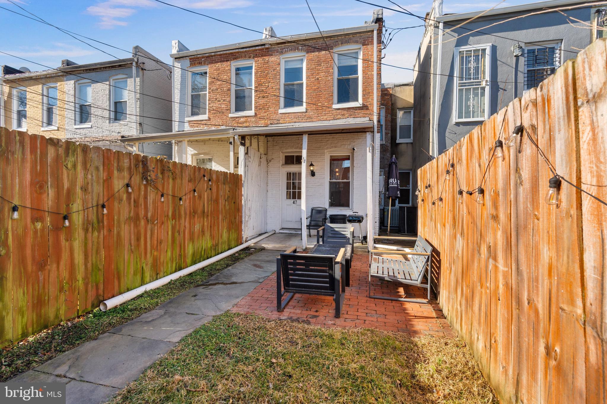 347 Yale Avenue Baltimore, MD 21229 - Photo 41 of 59 a view of a house with wooden floor and a chair