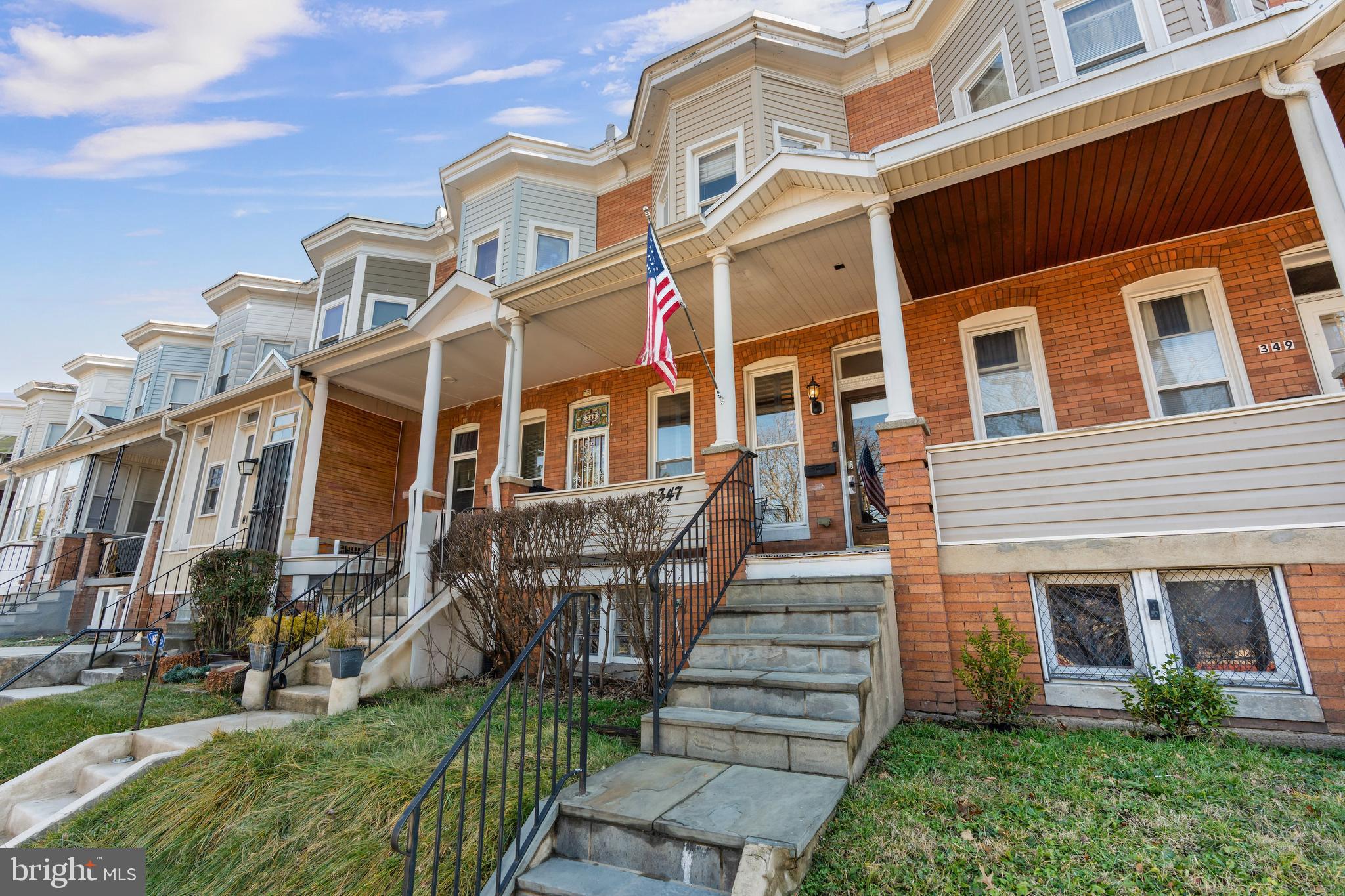 347 Yale Avenue Baltimore, MD 21229 - Photo 43 of 59 a front view of a house with a yard