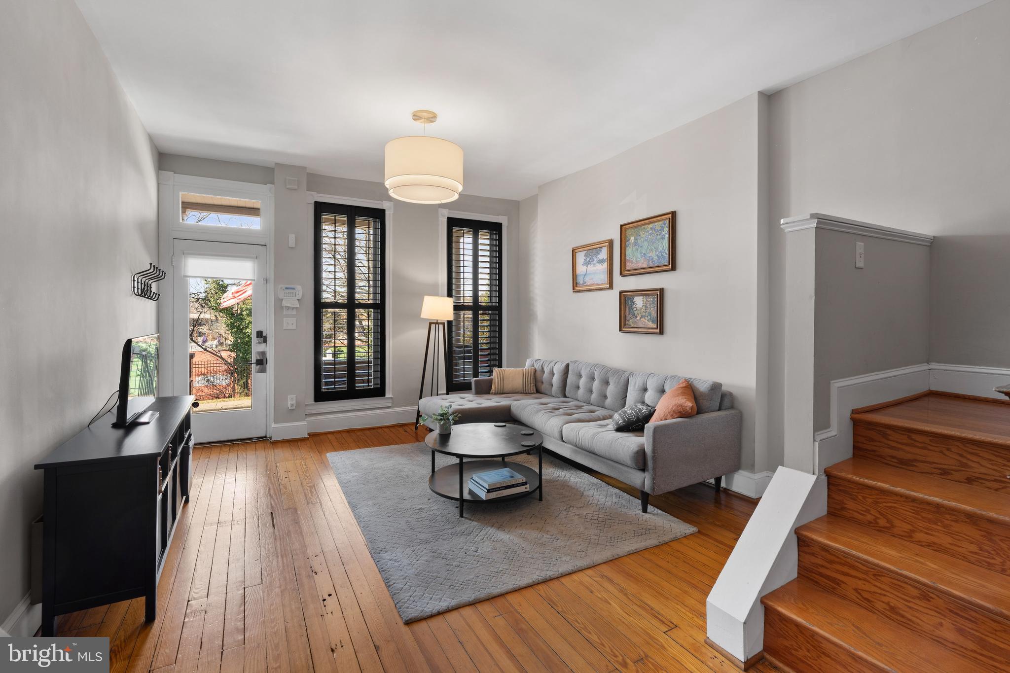 347 Yale Avenue Baltimore, MD 21229 - Photo 5 of 59 a living room with furniture and wooden floor