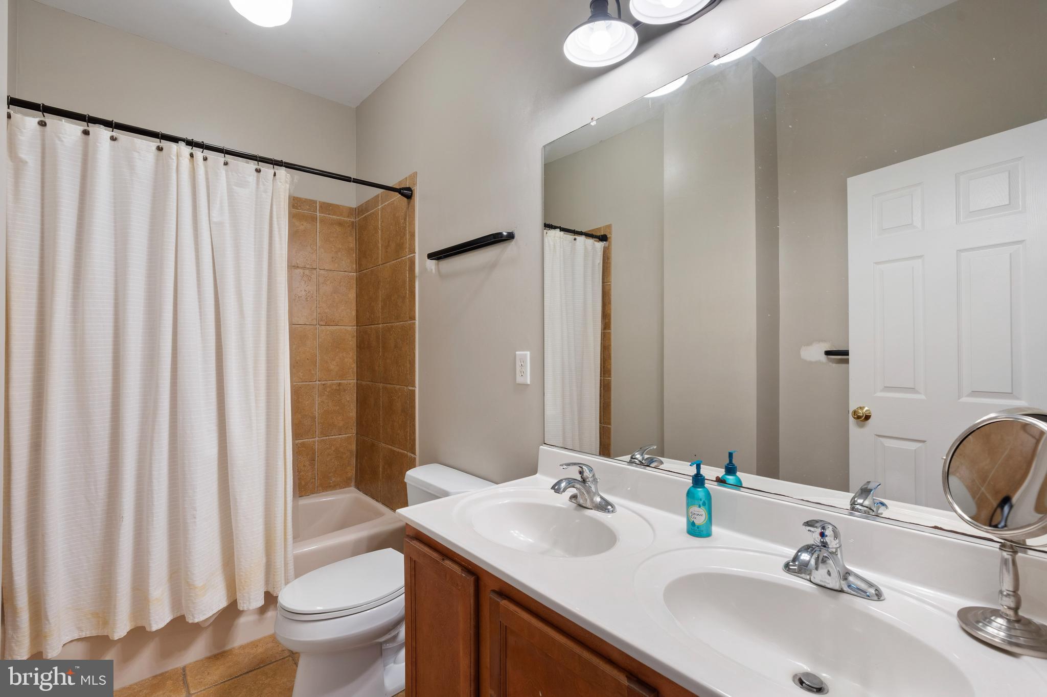 347 Yale Avenue Baltimore, MD 21229 - Photo 8 of 59 a bathroom with a sink toilet and shower