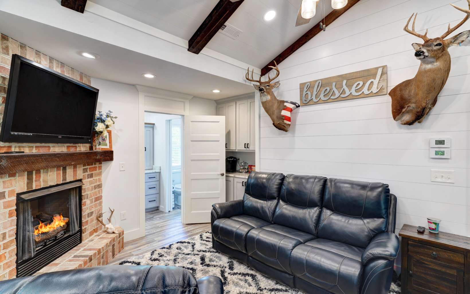60 Buckeye Branch Road Morganton, GA 30560 - Photo 10 of 21 a living room with furniture and a flat screen tv