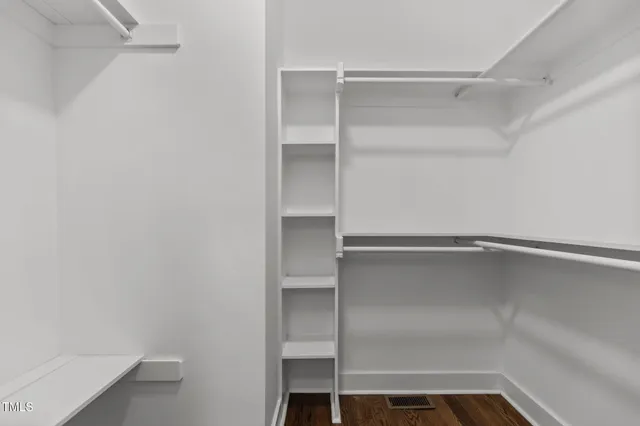 a empty closet with white paint