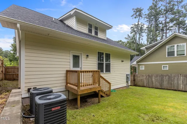 a view of a backyard with a garden
