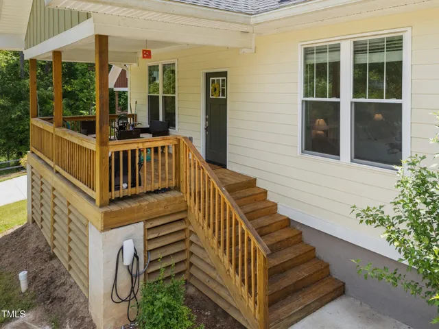 a view of stairs and wooden floor