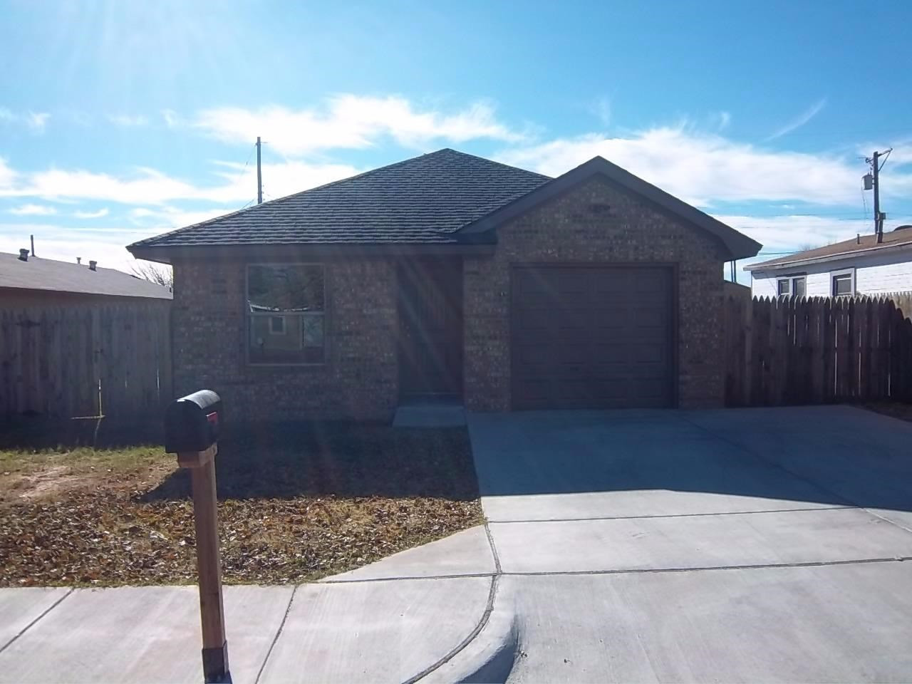 405 45th Street Lubbock, TX 79404 - Photo 1 of 3 a backyard of a house