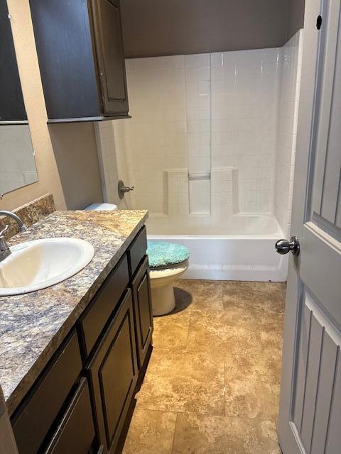 405 45th Street Lubbock, TX 79404 - Photo 3 of 3 a bathroom with a granite countertop sink toilet and shower