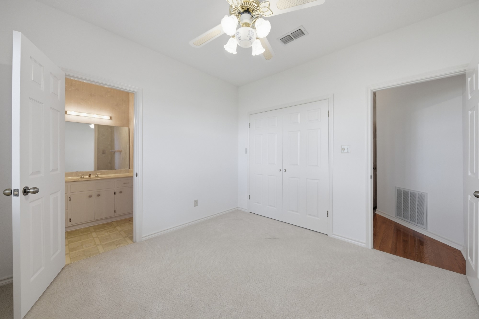 1552 Holub Road Schulenburg, TX 78956 - Photo 21 of 45 Bedroom 2 has access to the jack n jill bathroom with each having their own vanity.