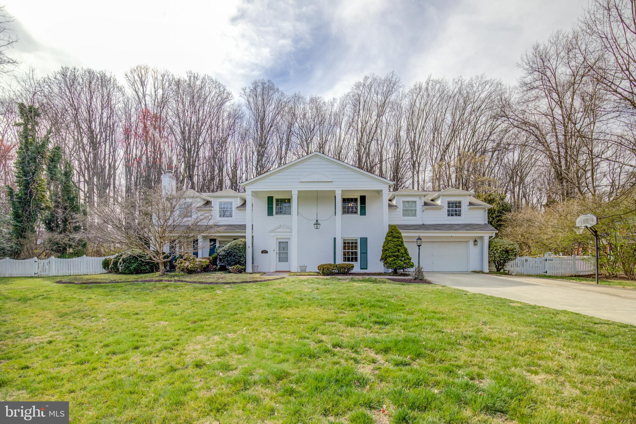 2054 Carrhill Road Vienna, VA 22181 - Photo 1 of 62 a front view of a house with a yard