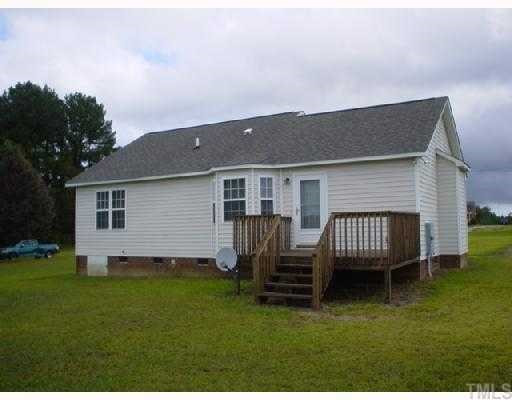 View of back of home that offers nice deck, great for grilling & entertaining! Exterior Back