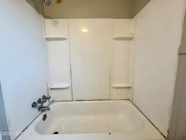 a bathroom with a bathtub