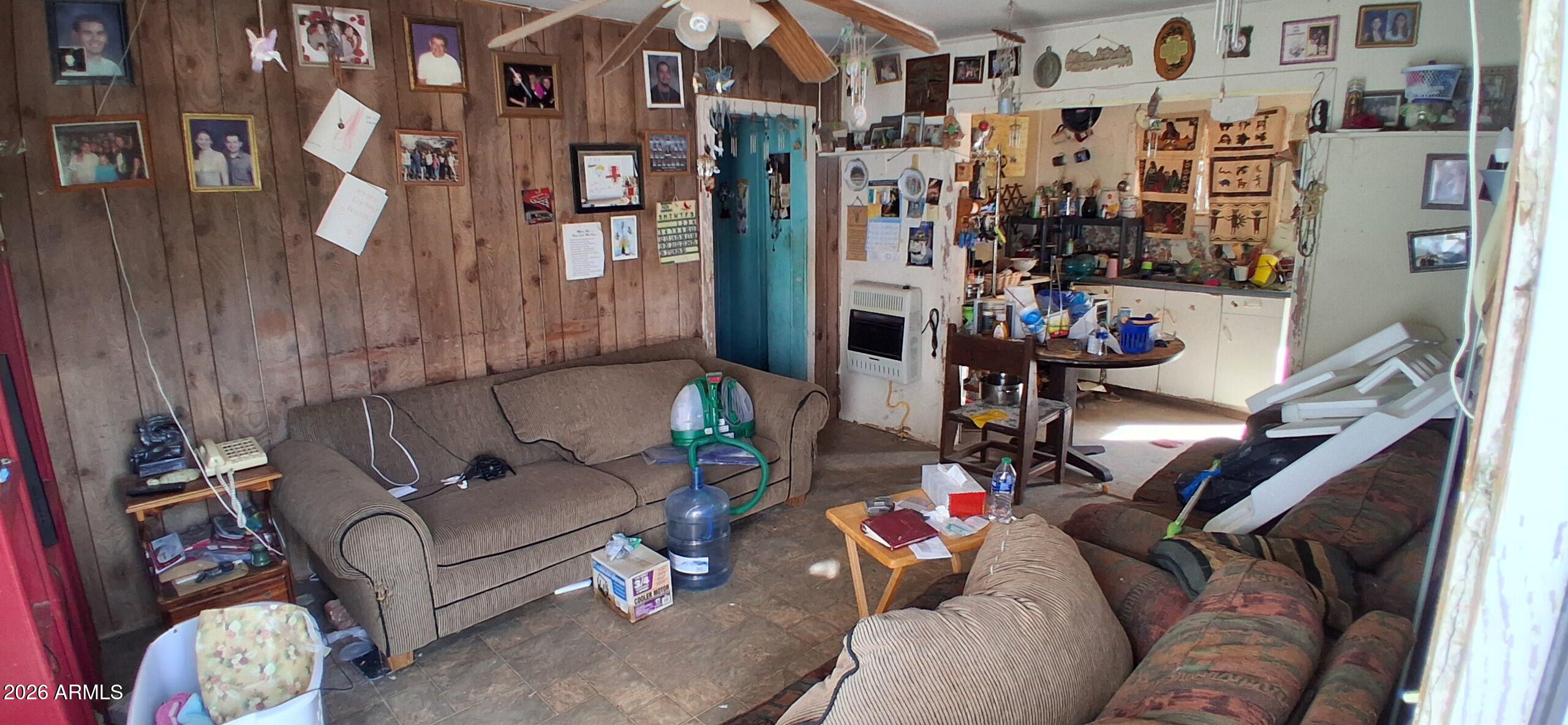 4048 South Cooley Ranch Road Winkelman, AZ 85192 - Photo 2 of 20 a living room with furniture and a couch