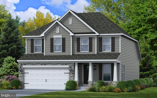 a view of house with yard