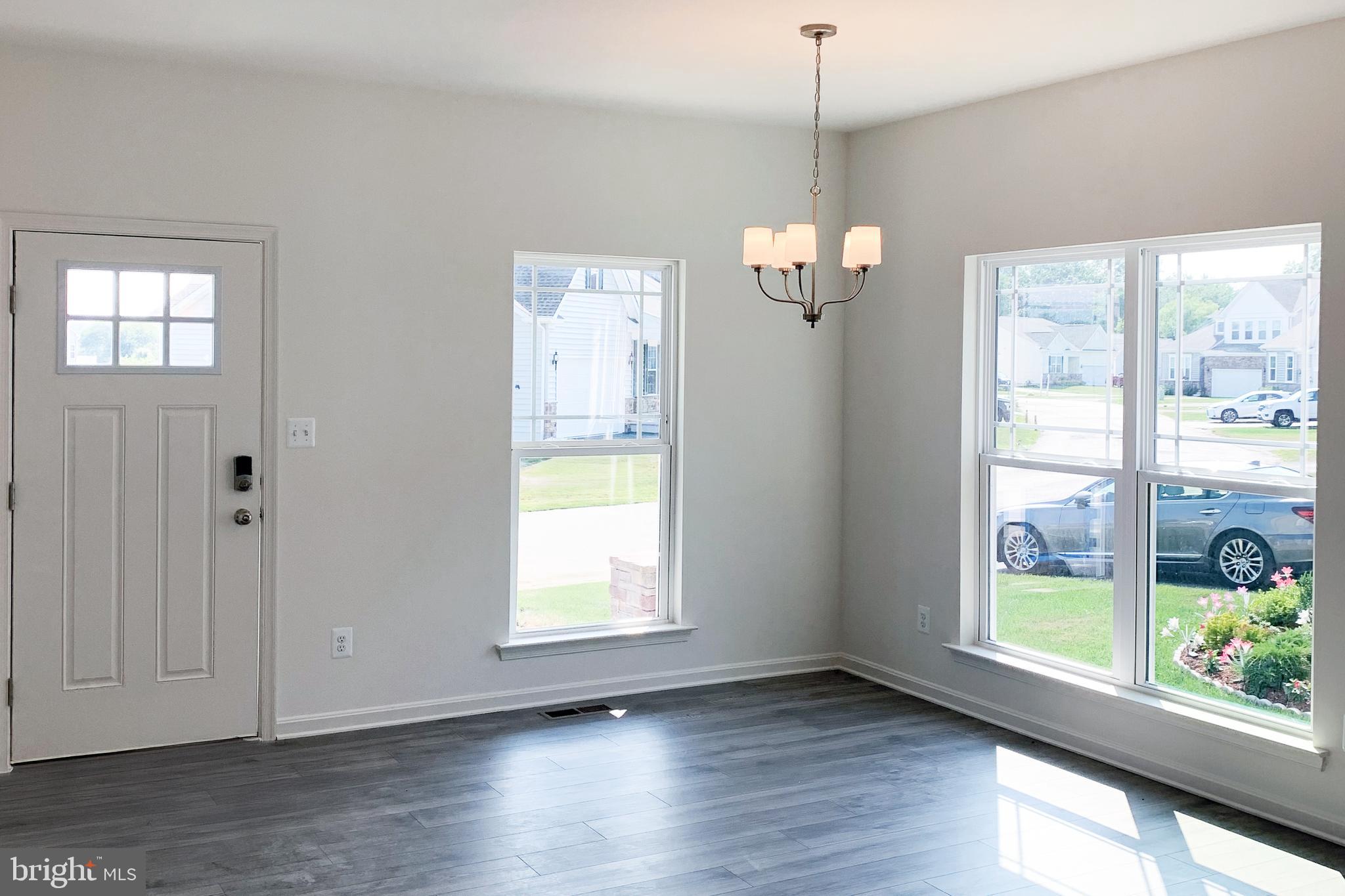 Tbd Tbd Nell Street Perryville, MD 21903 - Photo 6 of 13 a view of an empty room with wooden floor and a window