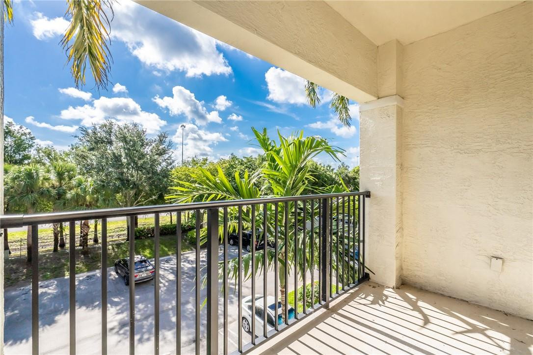 5860 West Sample Road, Unit 304 Coral Springs, FL 33067 - Photo 15 of 22 a view of a balcony