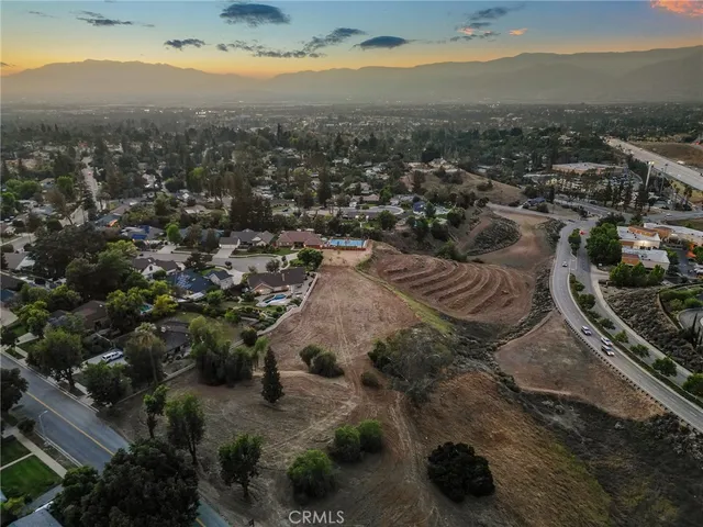 a view of a city with a lake