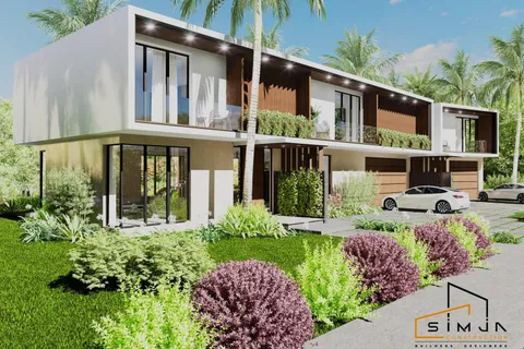 a front view of a house with a yard and potted plants