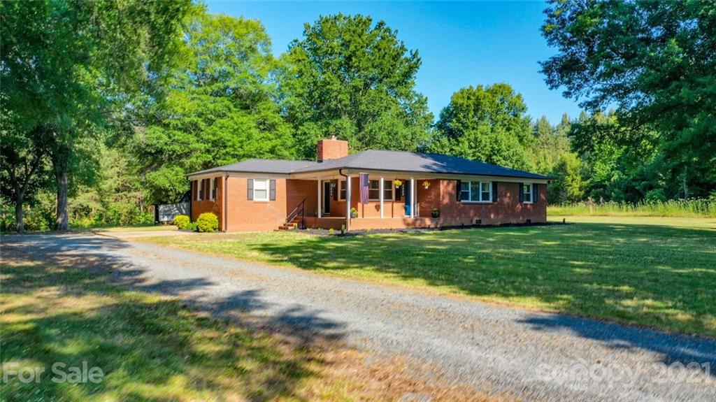 3802 Austin Road Monroe, NC 28112 - Photo 1 of 43 a view of a yard in front of house