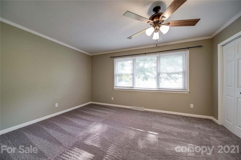 3802 Austin Road Monroe, NC 28112 - Photo 23 of 43 a view of an empty room with a window