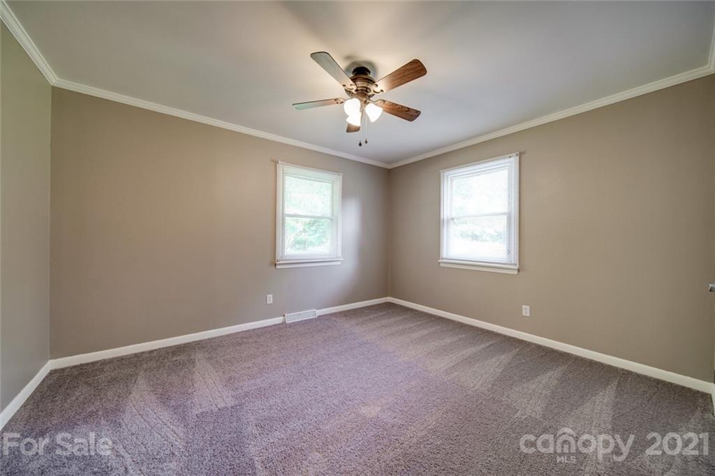 3802 Austin Road Monroe, NC 28112 - Photo 30 of 43 a view of an empty room with a window