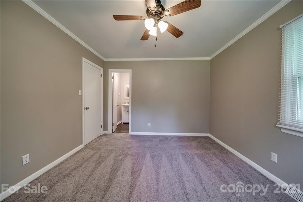 3802 Austin Road Monroe, NC 28112 - Photo 38 of 43 wooden floor in an empty room with a window