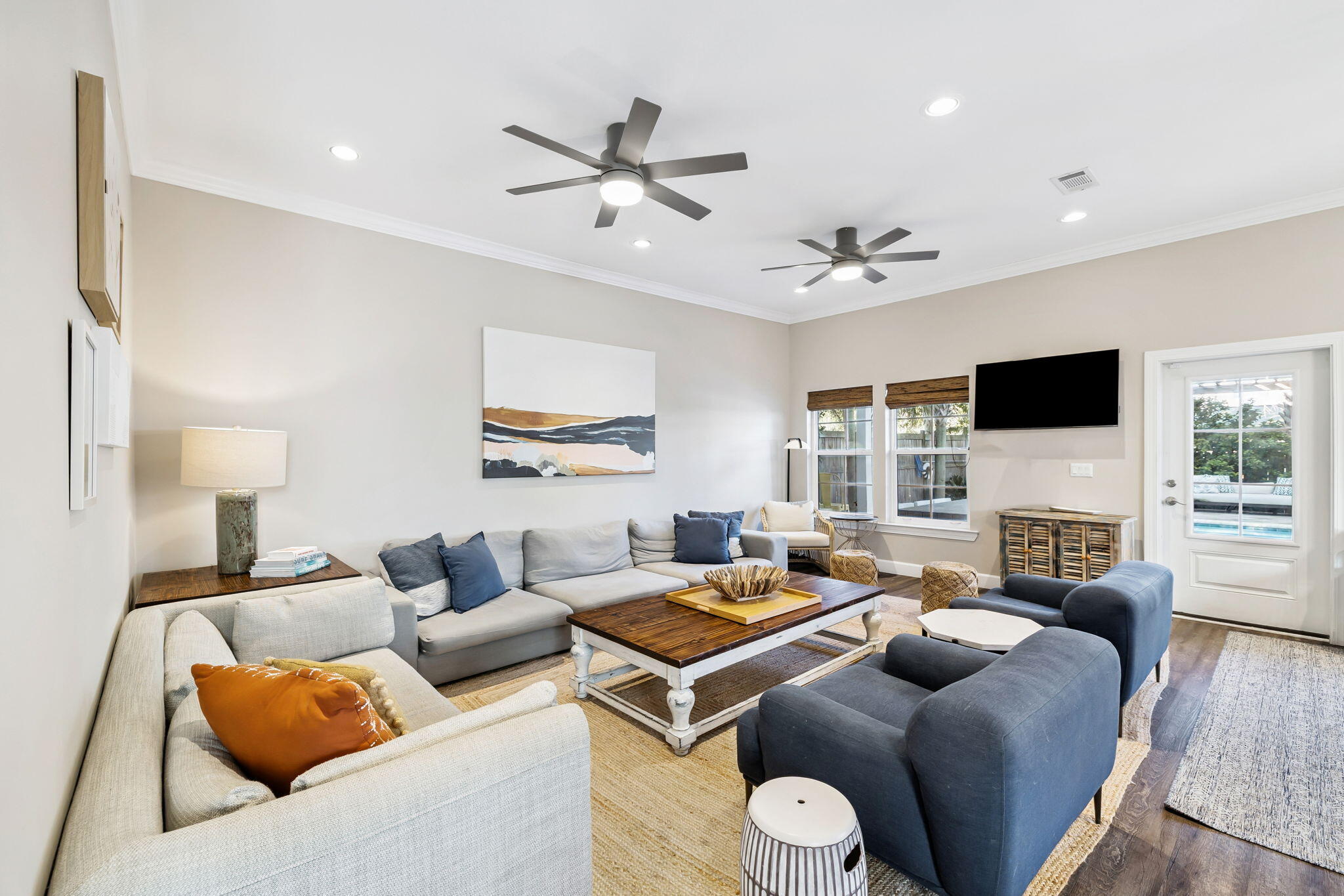 20 Sundance Court Miramar Beach, FL 32550 - Photo 15 of 53 a living room with furniture ceiling fan and a fireplace