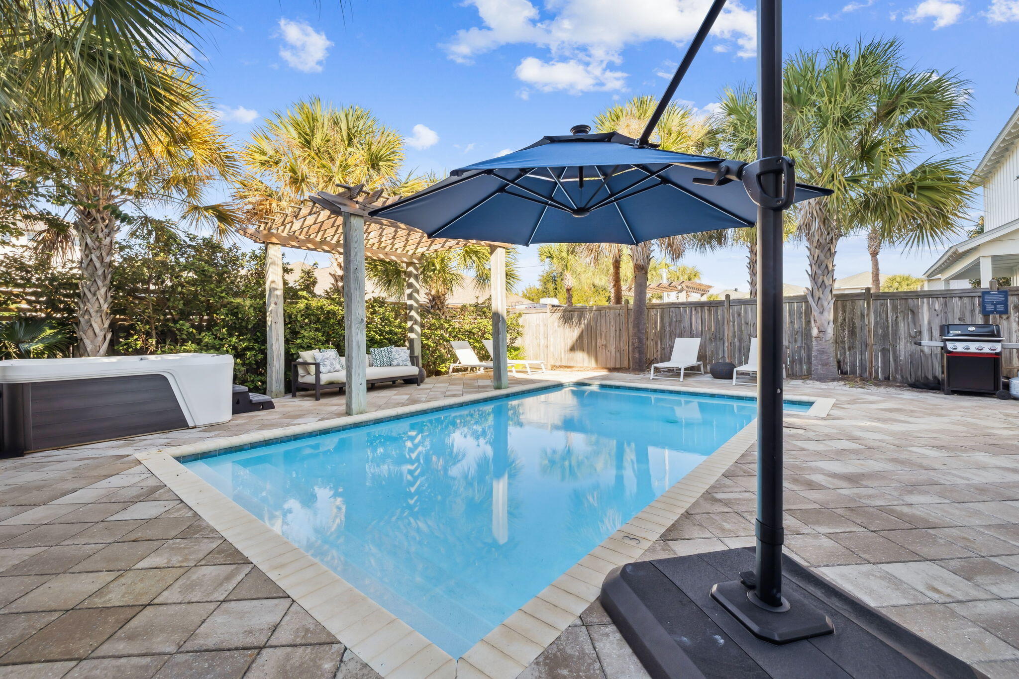 20 Sundance Court Miramar Beach, FL 32550 - Photo 24 of 53 a view of swimming pool with a patio and a garden
