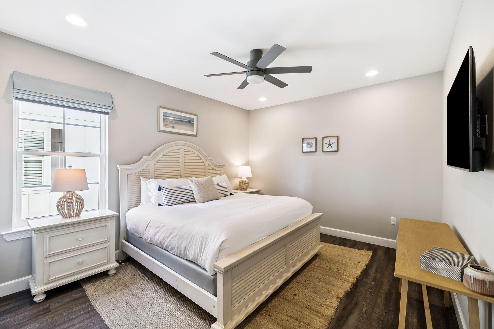 20 Sundance Court Miramar Beach, FL 32550 - Photo 32 of 53 a bedroom with a bed and wooden floor