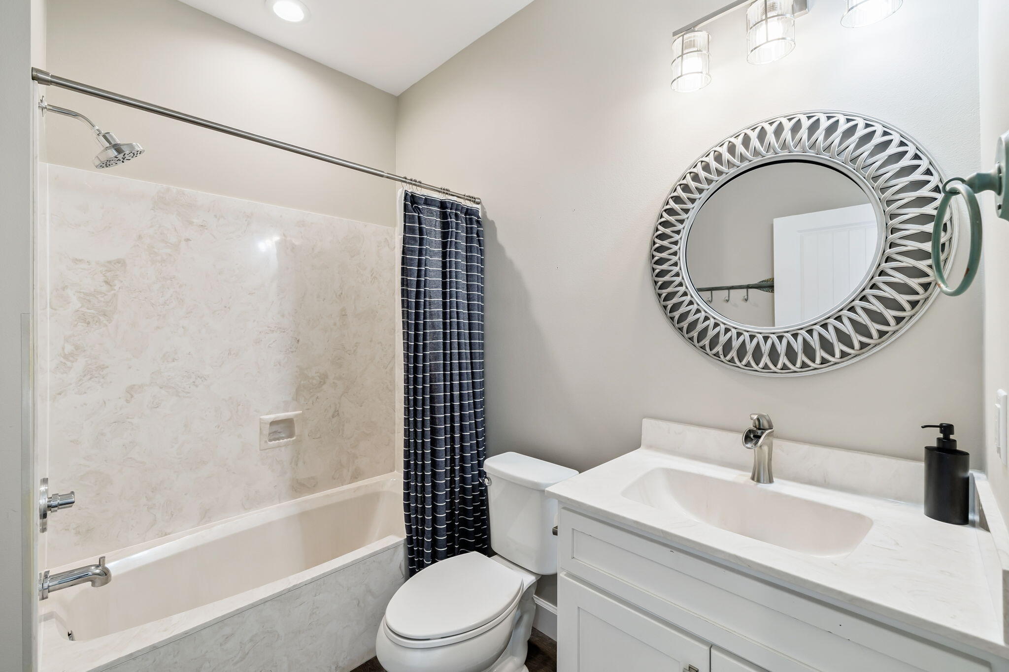 20 Sundance Court Miramar Beach, FL 32550 - Photo 34 of 53 a bathroom with a sink a toilet and a mirror