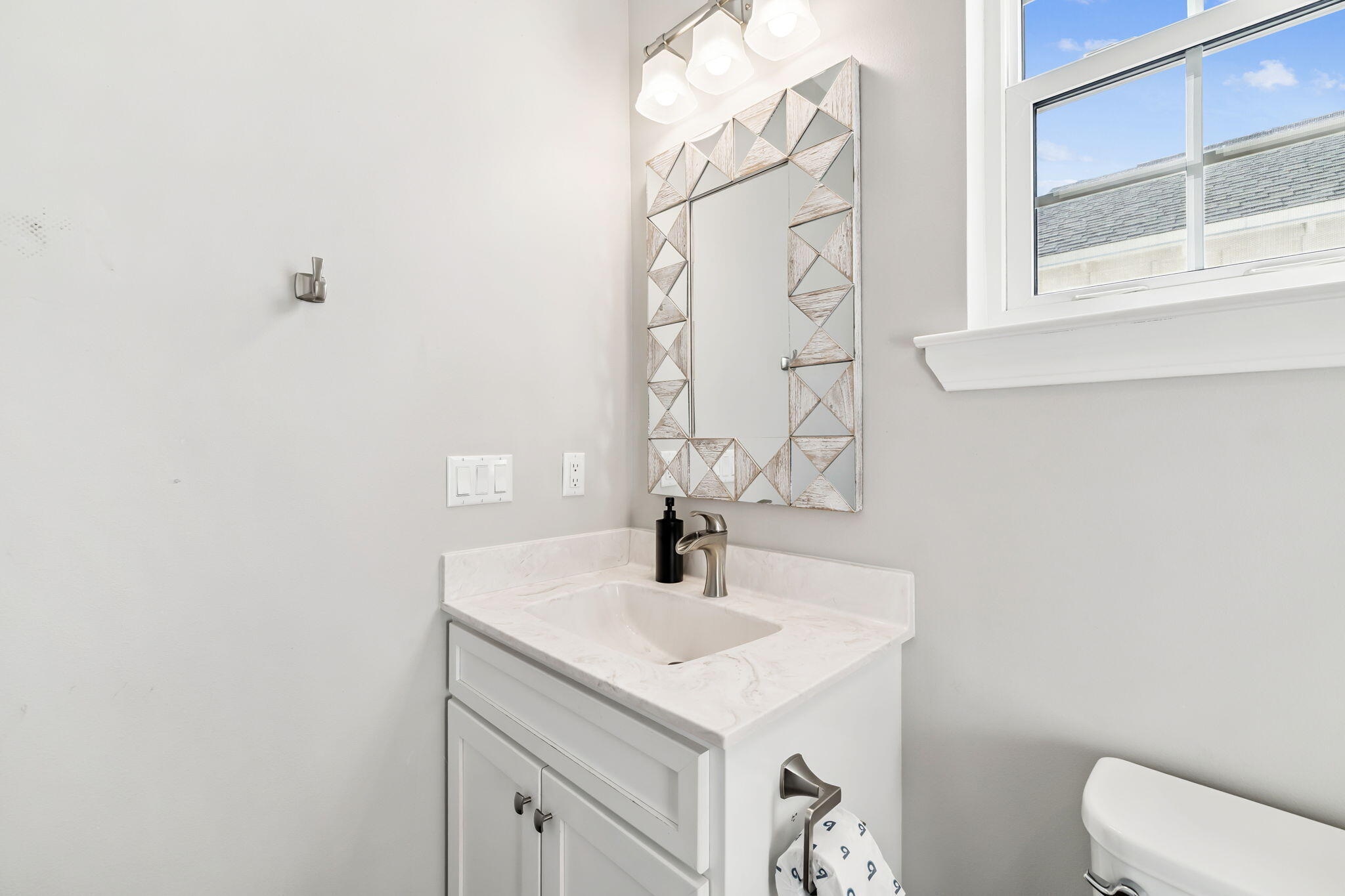 20 Sundance Court Miramar Beach, FL 32550 - Photo 45 of 53 a bathroom with a sink and a mirror