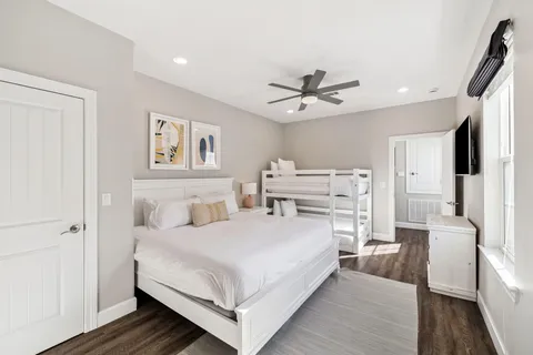a bathroom with a sink toilet tub and shower