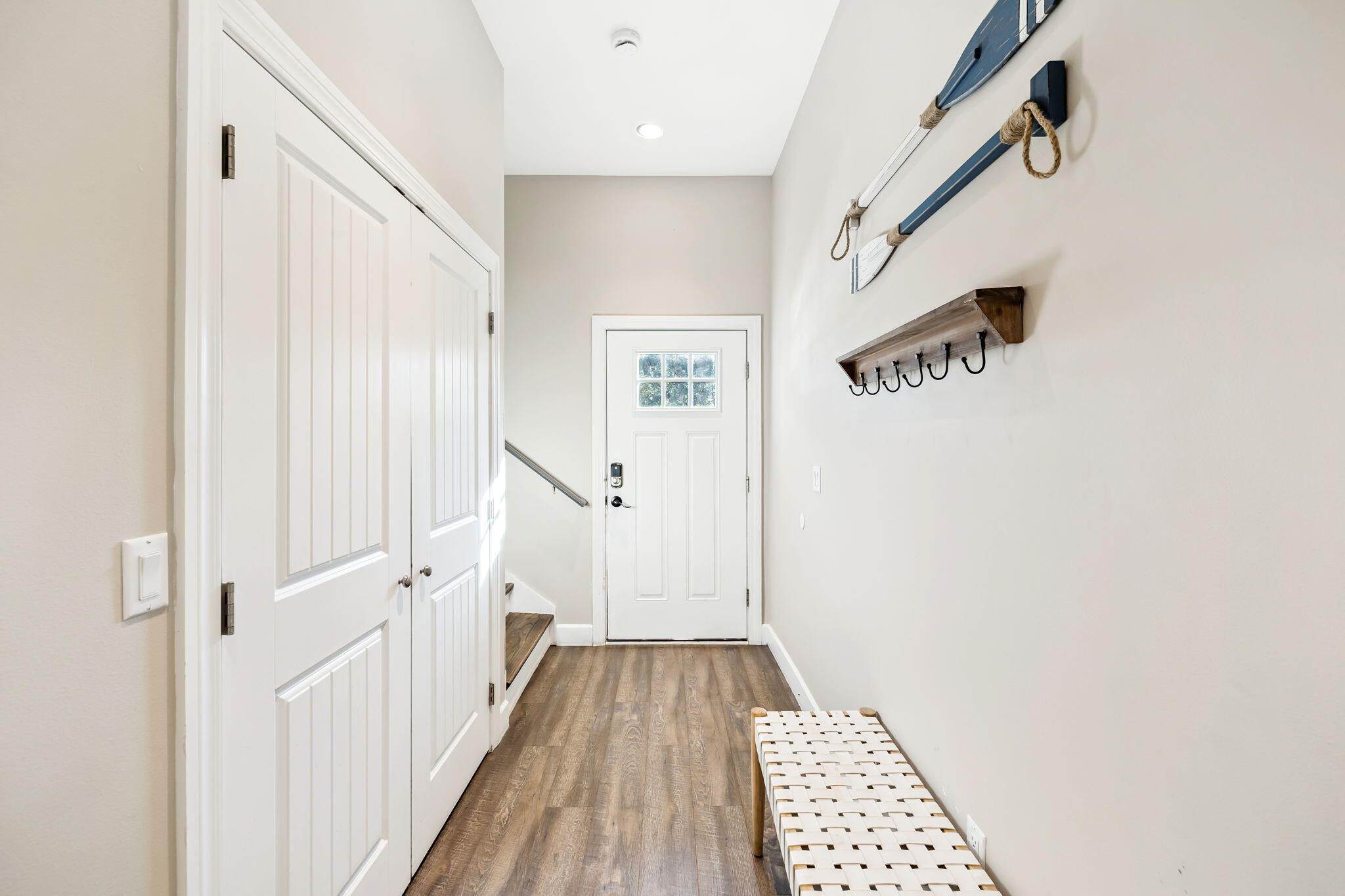 20 Sundance Court Miramar Beach, FL 32550 - Photo 6 of 53 a view of a hallway with wooden floor and entryway