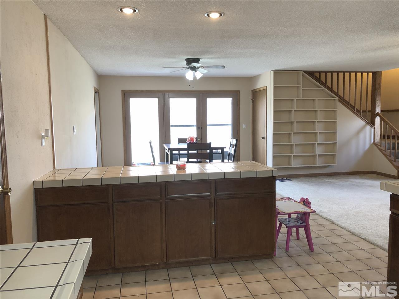 3351 Bryan Street Reno, NV 89503 - Photo 11 of 24 a kitchen with a sink cabinets and window