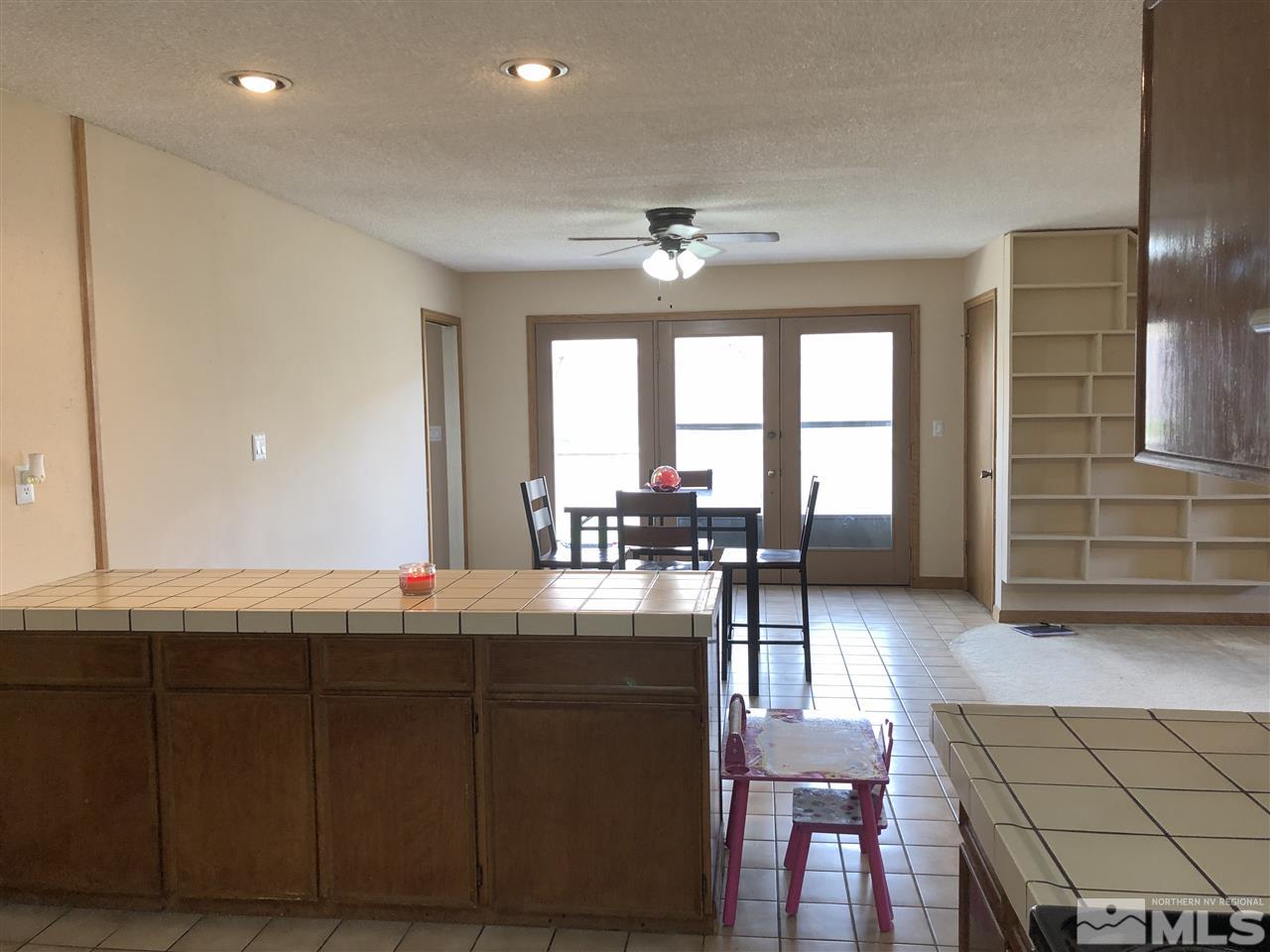 3351 Bryan Street Reno, NV 89503 - Photo 12 of 24 a living room with hard wood flooring and furniture