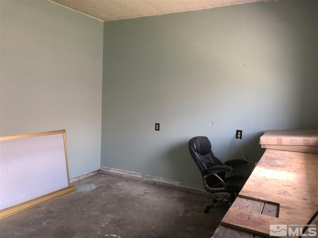 3351 Bryan Street Reno, NV 89503 - Photo 17 of 24 a room with furniture and a window