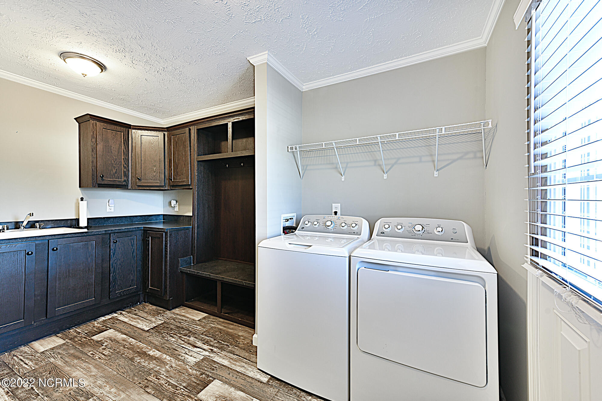 8989 Point Caswell Road Atkinson, NC 28421 - Photo 18 of 19 Laundry and Utility Room
