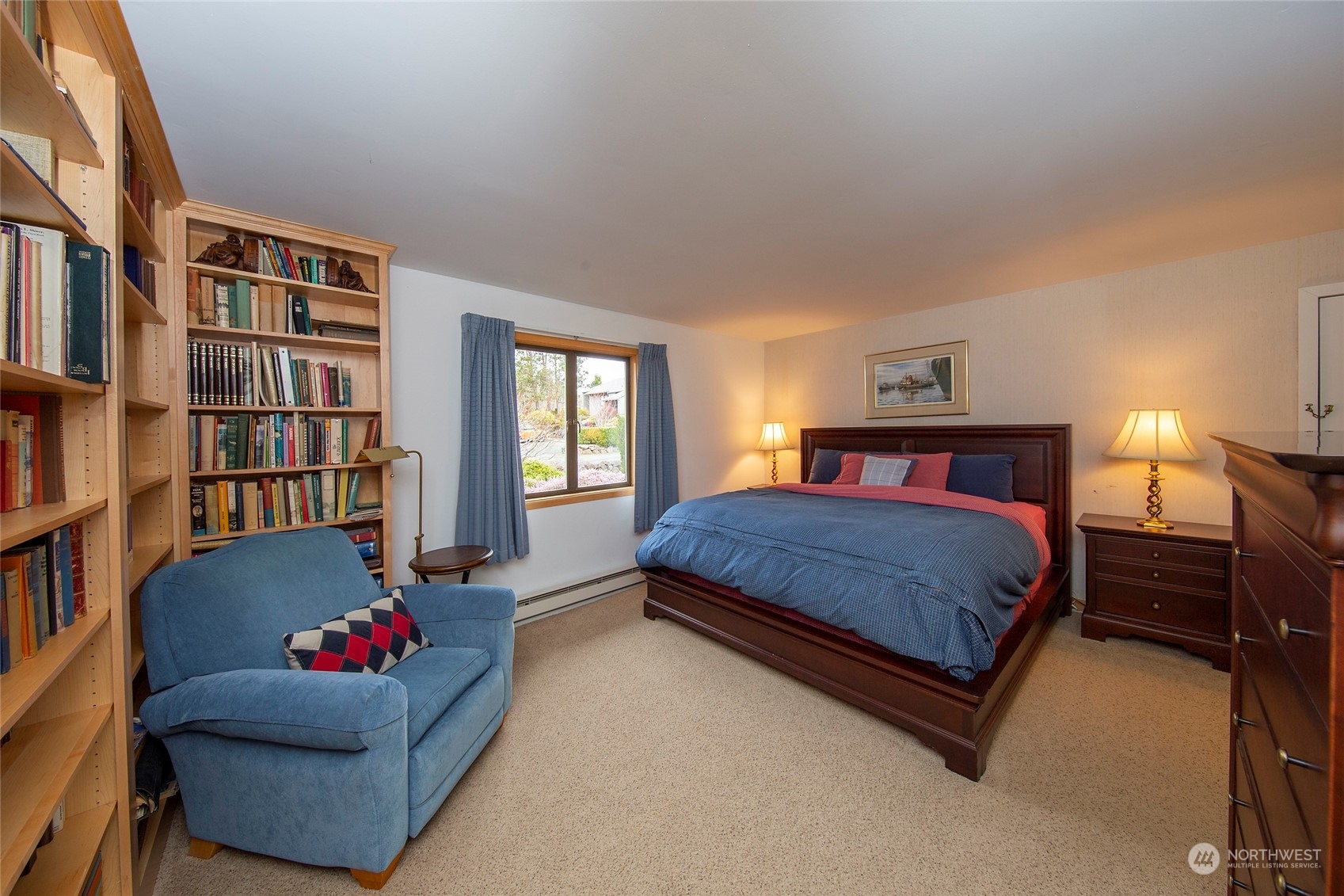 40 Olympic Way, Unit 9 Port Ludlow, WA 98365 - Photo 11 of 35 a bedroom with a bed and a couch