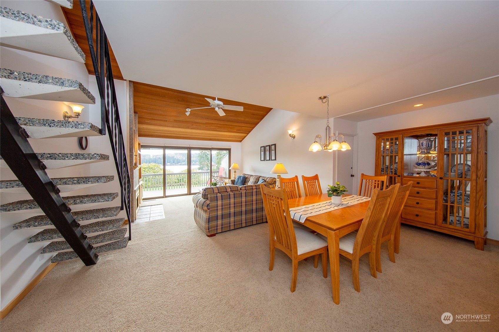 40 Olympic Way, Unit 9 Port Ludlow, WA 98365 - Photo 2 of 35 a dining room with furniture and wooden floor