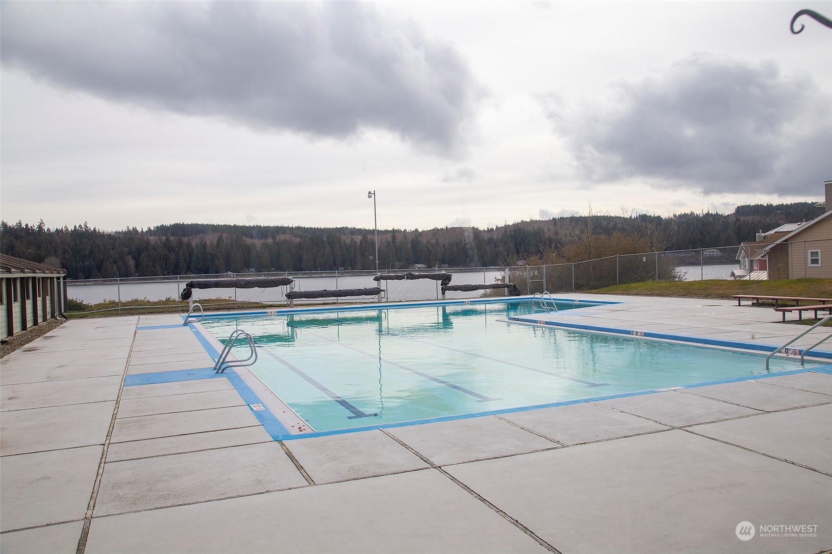 40 Olympic Way, Unit 9 Port Ludlow, WA 98365 - Photo 25 of 35 a view of a swimming pool and a yard