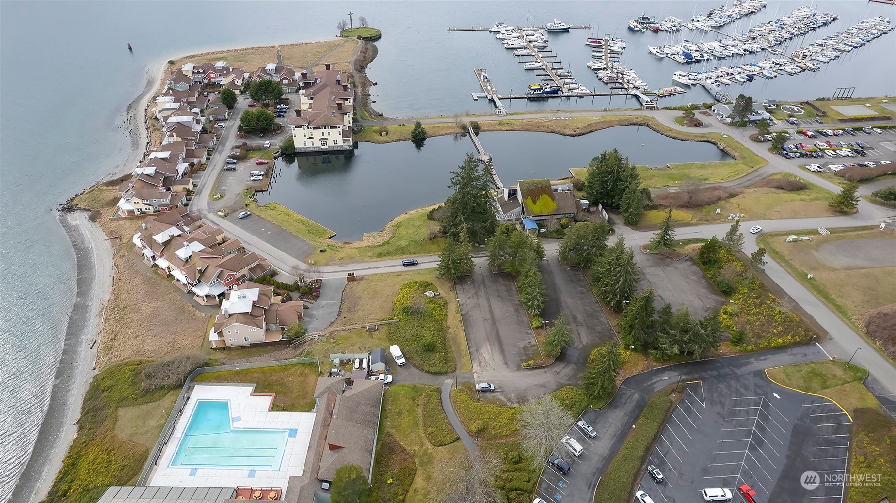 40 Olympic Way, Unit 9 Port Ludlow, WA 98365 - Photo 29 of 35 an aerial view of residential houses with outdoor space