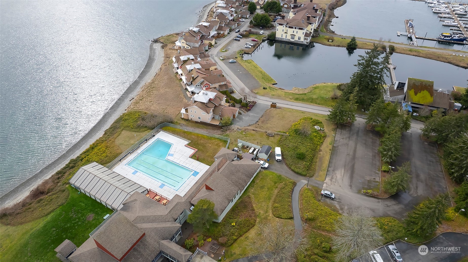 40 Olympic Way, Unit 9 Port Ludlow, WA 98365 - Photo 30 of 35 an aerial view of a house with a swimming pool